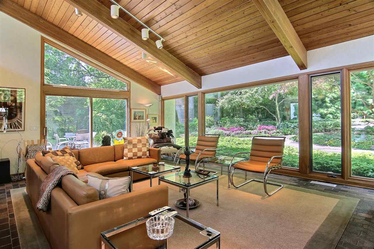 600 Riverside Road Belvidere, IL 61008 - Photo 8 of 25 a living room with furniture and floor to ceiling windows