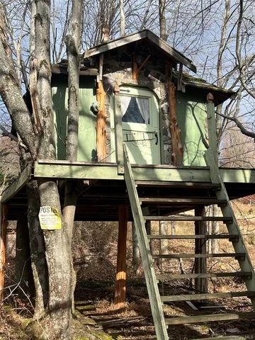 a front view of a house with parking
