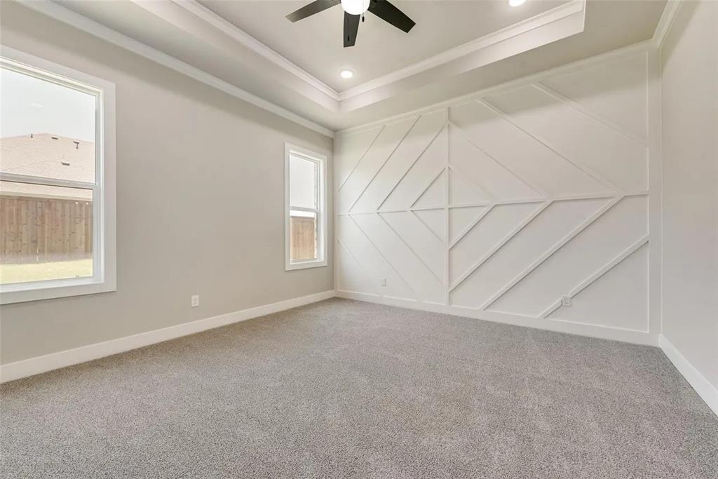 1327 Selby Road Van Alstyne, TX 75495 - Photo 21 of 32 Carpeted empty room with a decorative wall, a ceiling fan, ornamental molding, and recessed lighting