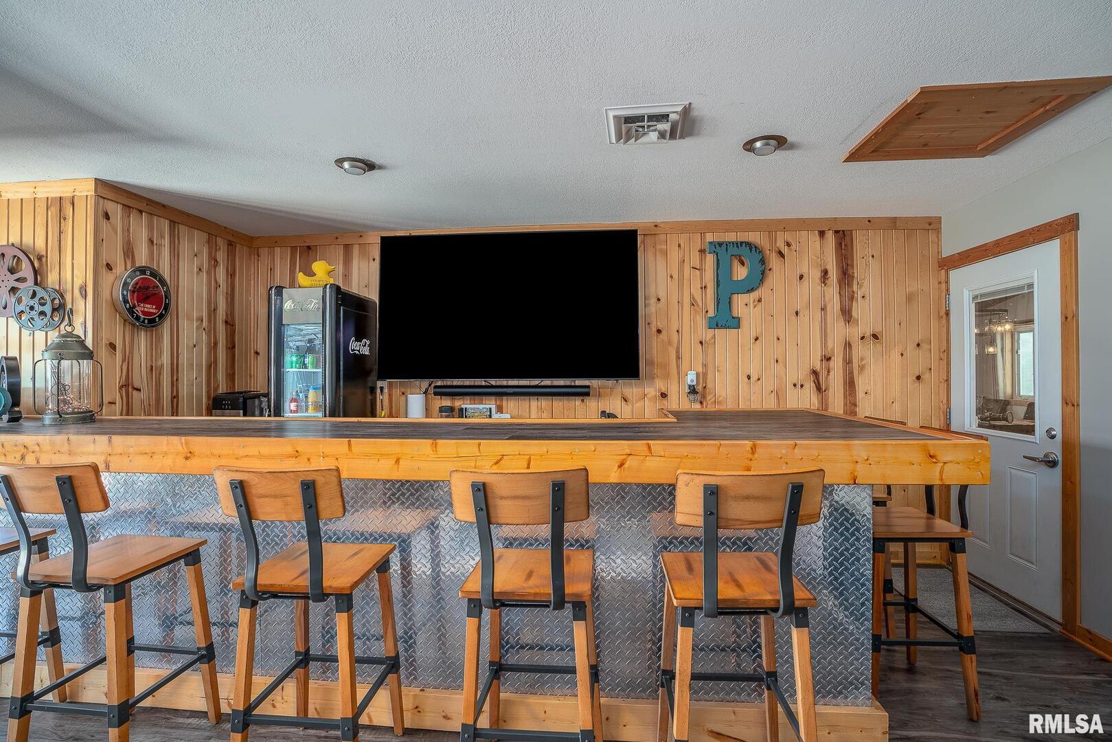 1012 Viaduct Road Savanna, IL 61074 - Photo 16 of 29 a dining room with furniture and wooden floor
