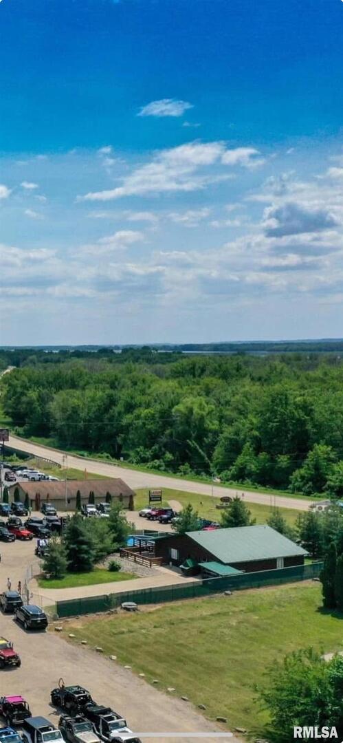 1012 Viaduct Road Savanna, IL 61074 - Photo 19 of 29 a view of a city with lawn chairs and swimming pool