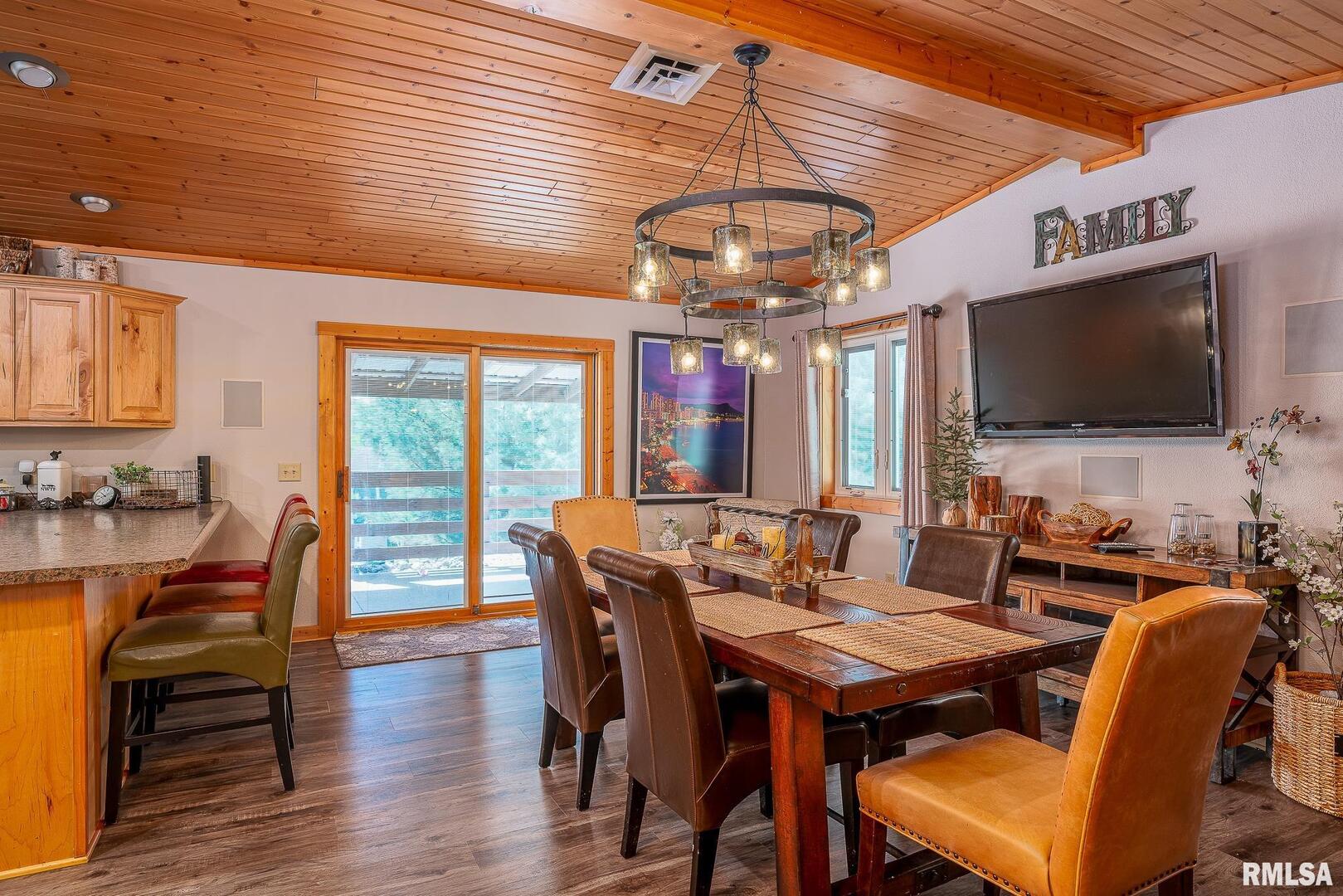 1012 Viaduct Road Savanna, IL 61074 - Photo 7 of 29 a view of a dining room with furniture window and wooden floor