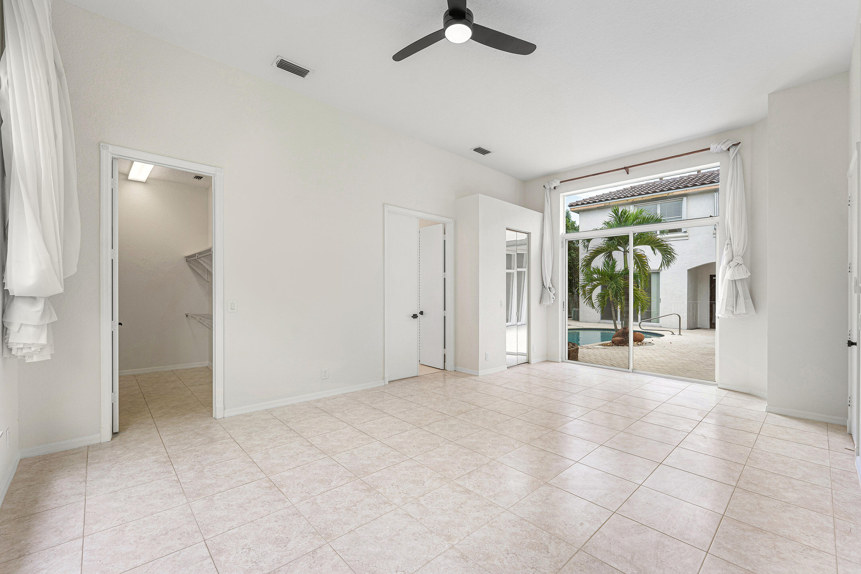 18596 Ocean Mist Drive Boca Raton, FL 33498 - Photo 25 of 51 First Floor Primary Bedroom