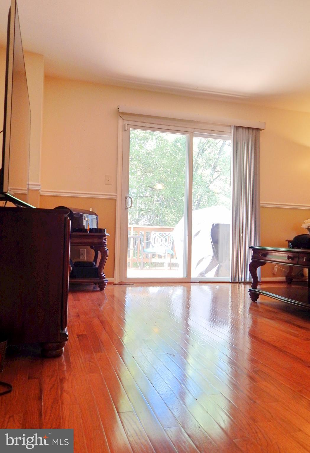 2408 Potterfield Road Baltimore, MD 21244 - Photo 12 of 30 Living Room w/ Deck View