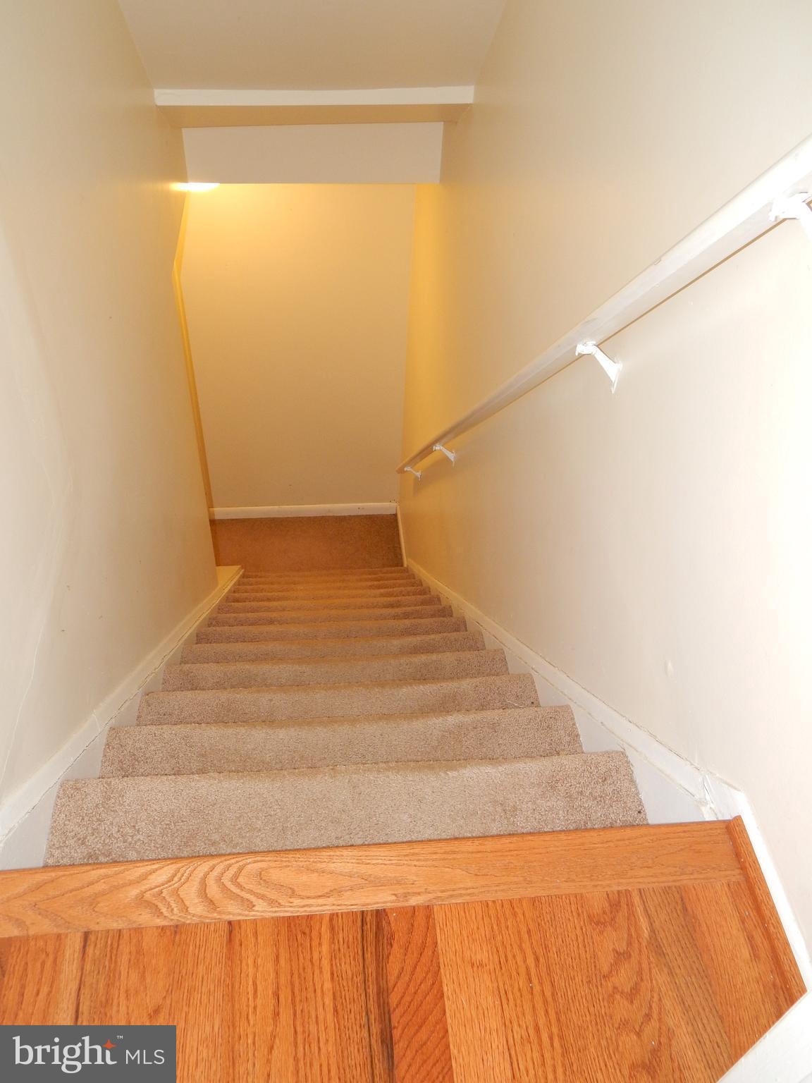 2408 Potterfield Road Baltimore, MD 21244 - Photo 24 of 30 Stairwell to finished Lower Level