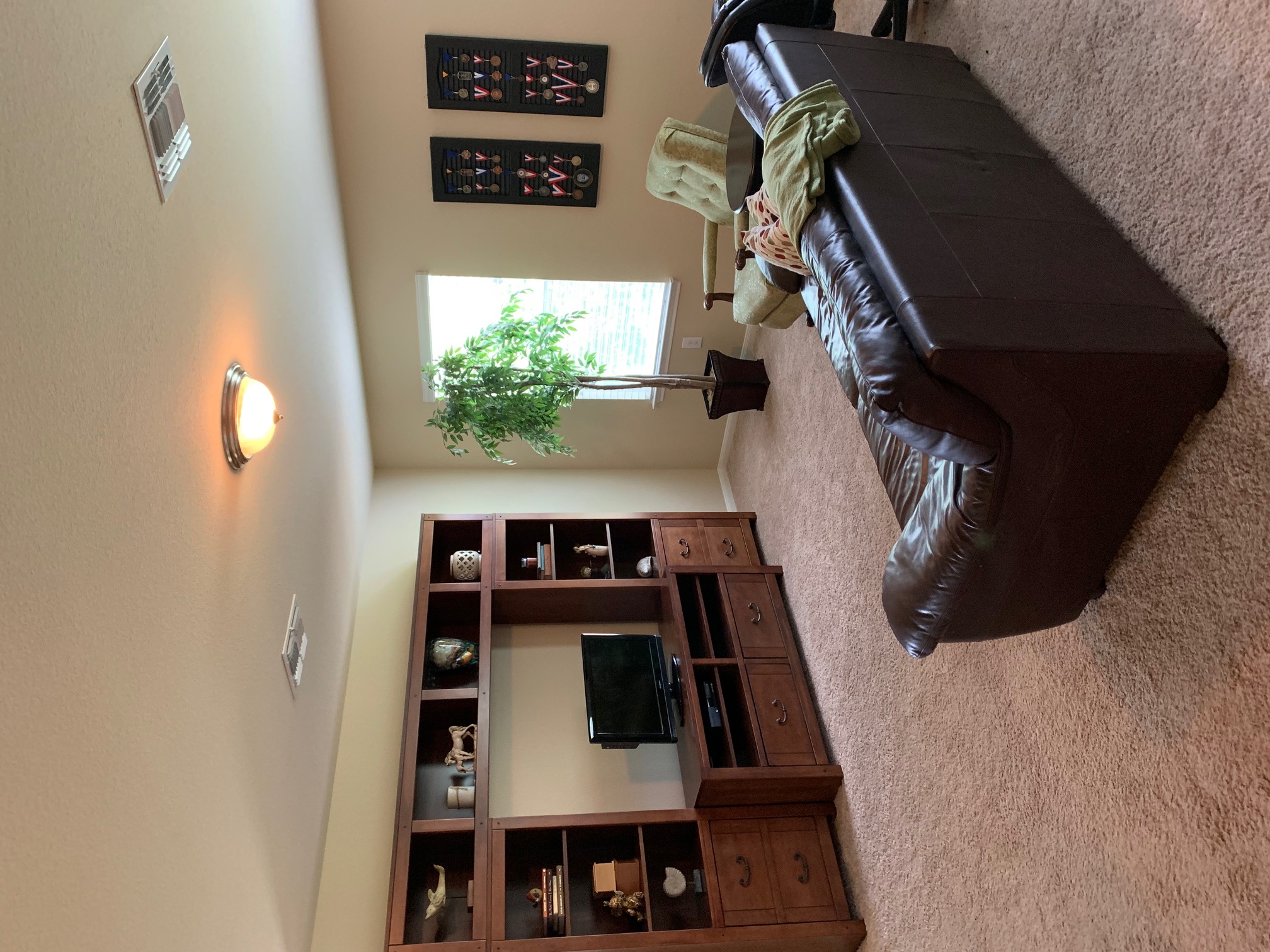 2020 Mottey Street Georgetown, TX 78626 - Photo 19 of 24 Living room with light carpet and baseboards
