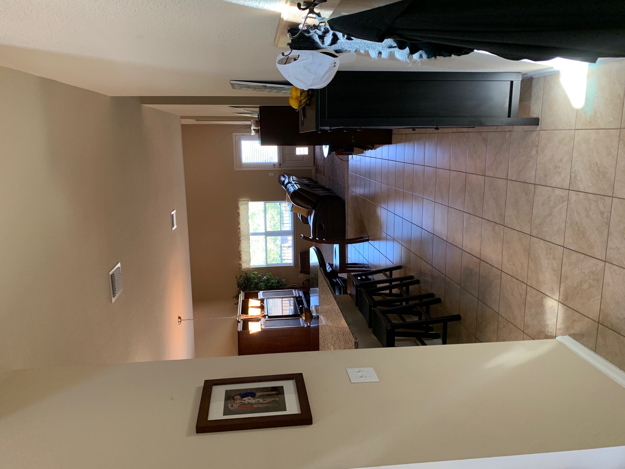 2020 Mottey Street Georgetown, TX 78626 - Photo 2 of 24 Hallway with light tile patterned flooring and baseboards