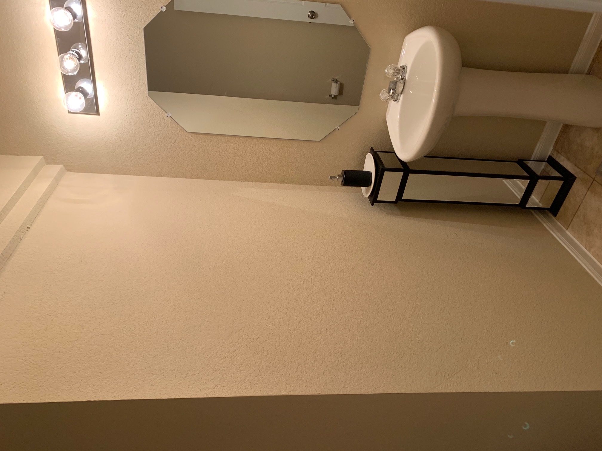 2020 Mottey Street Georgetown, TX 78626 - Photo 8 of 24 Bathroom featuring a textured wall and light tile patterned floors