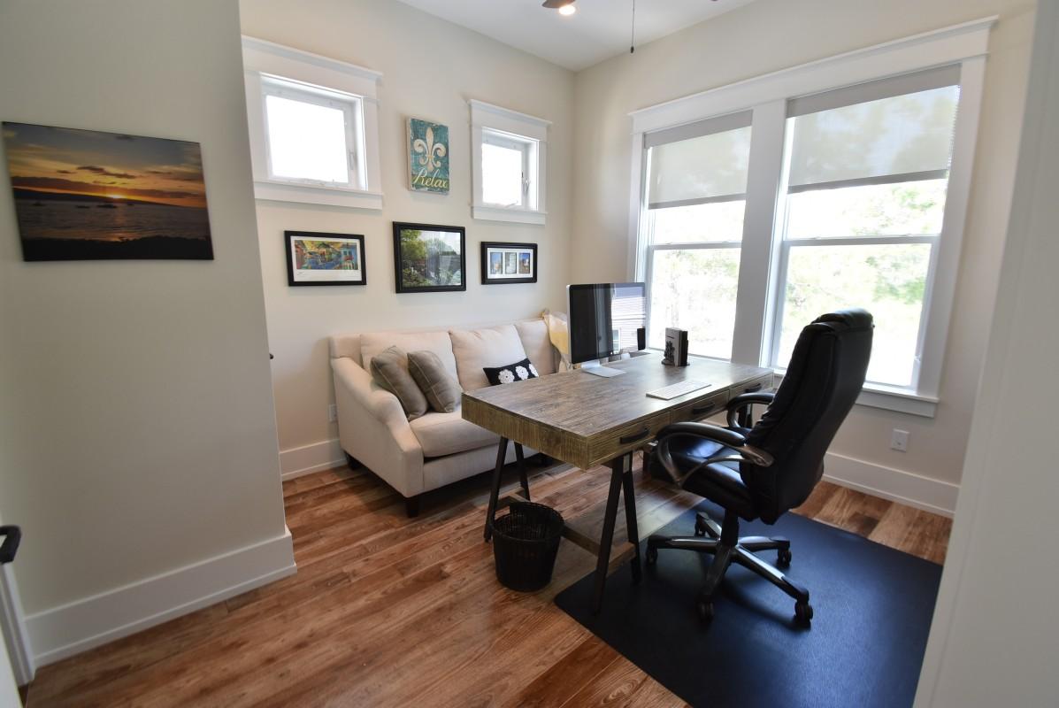 453 Matt's Way Santa Rosa Beach, FL 32459 - Photo 15 of 24 a view of a dining room with furniture window and wooden floor