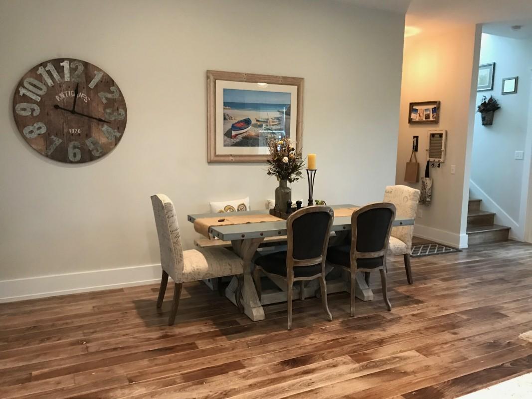 453 Matt's Way Santa Rosa Beach, FL 32459 - Photo 8 of 24 a view of a dining room with furniture and wooden floor