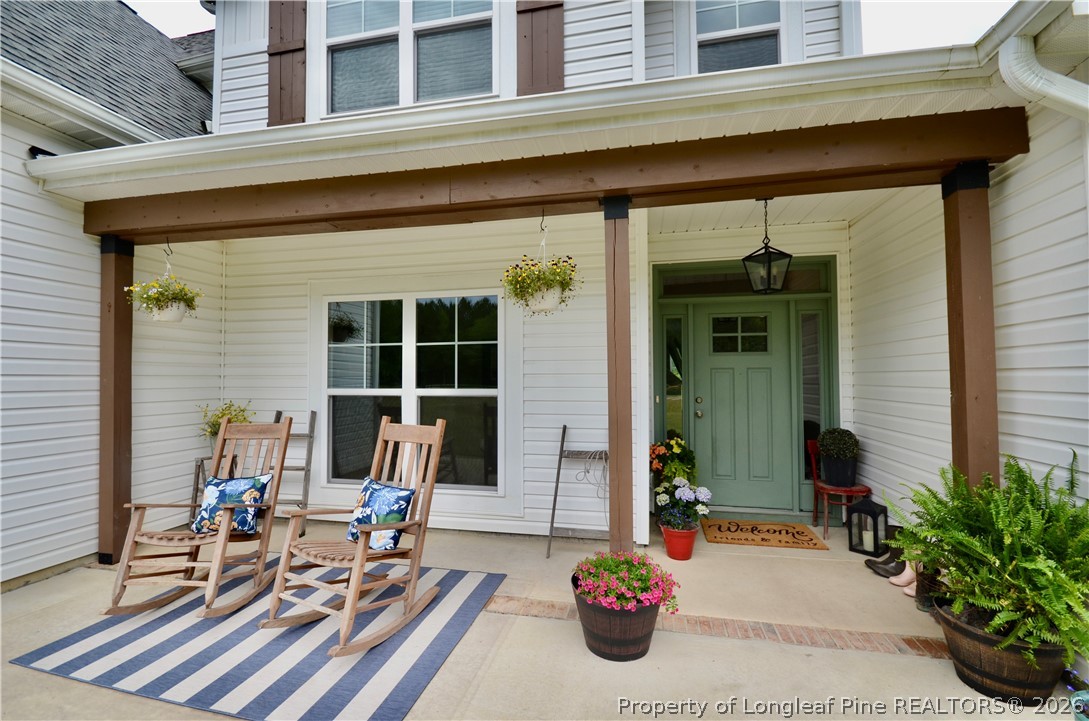 1865 John B Carter Road Fayetteville, NC 28312 - Photo 2 of 49 a view of a two chair in the balcony
