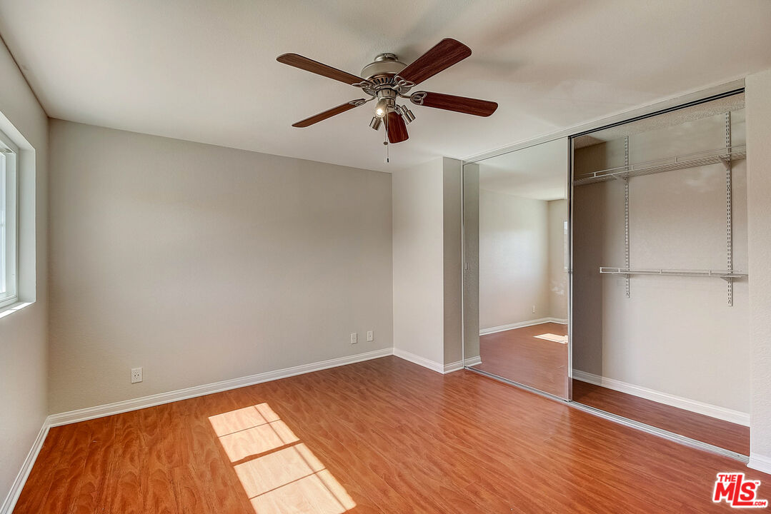 2137 Crosscreek Avenue Simi Valley, CA 93063 - Photo 20 of 31 wooden floor in an empty room with a window
