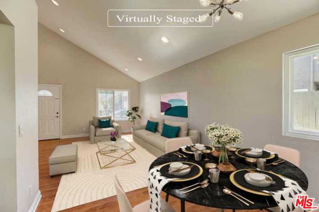 2137 Crosscreek Avenue Simi Valley, CA 93063 - Photo 2 of 31 a living room with furniture and a chandelier