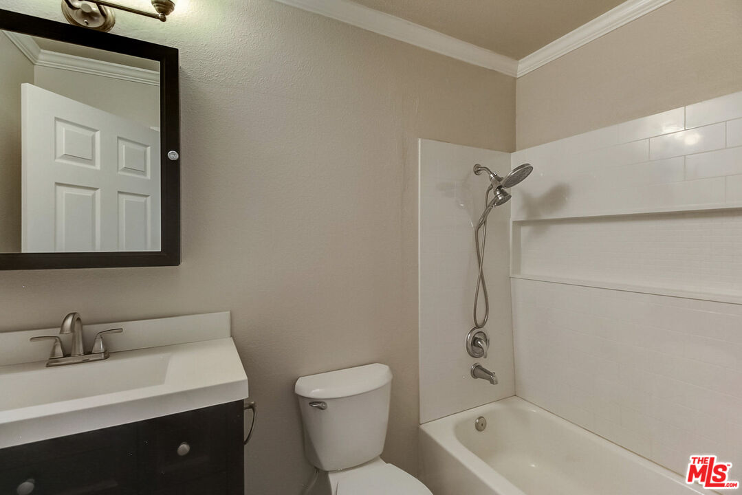 2137 Crosscreek Avenue Simi Valley, CA 93063 - Photo 24 of 31 a bathroom with a sink a toilet and shower