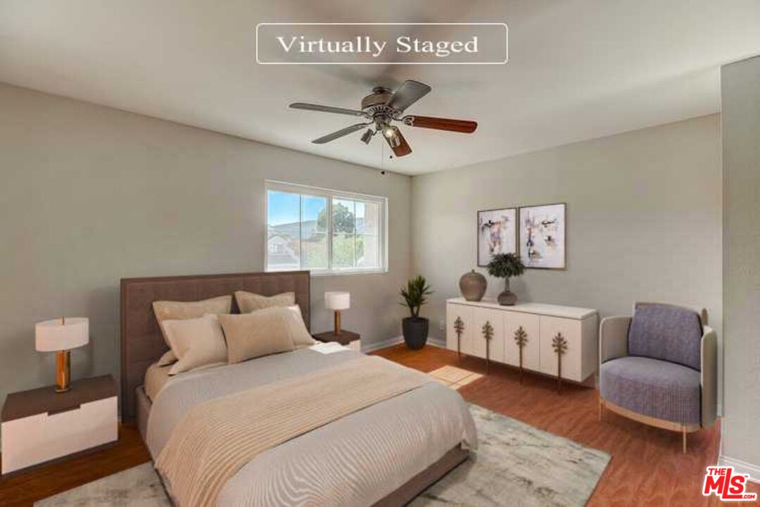 2137 Crosscreek Avenue Simi Valley, CA 93063 - Photo 3 of 31 a spacious bedroom with a bed and a couch