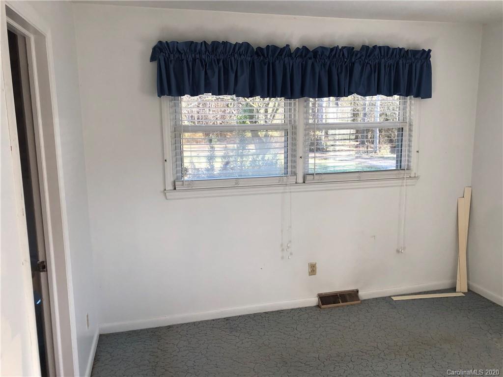 4701 Old Hickory Road Lancaster, SC 29720 - Photo 11 of 24 a view of a small space with wooden floor and a window