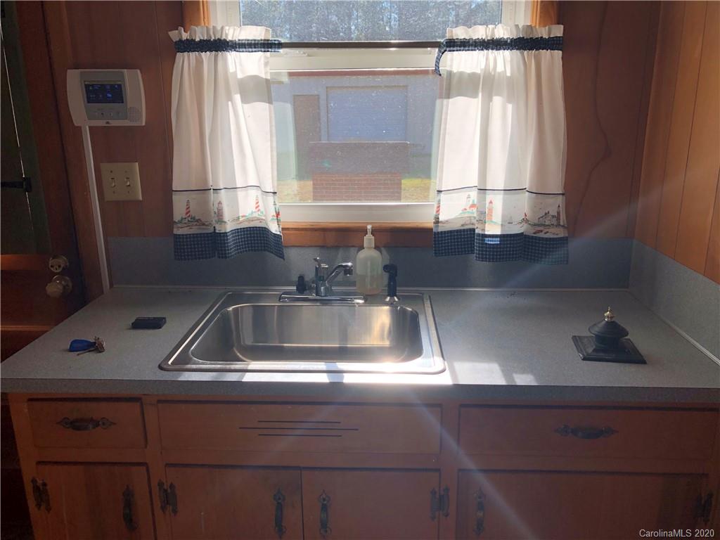 4701 Old Hickory Road Lancaster, SC 29720 - Photo 3 of 24 a kitchen with a sink and a window