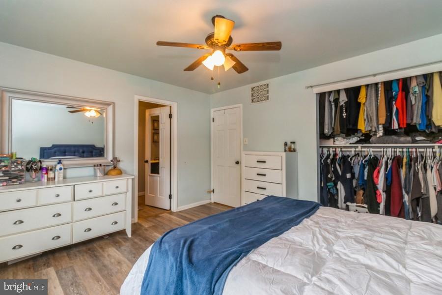 1008 London Circle Williamstown, NJ 08094 - Photo 12 of 25 a bed room with a bed and a television