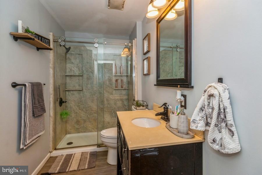 1008 London Circle Williamstown, NJ 08094 - Photo 15 of 25 a bathroom with a sink vanity granite and shower