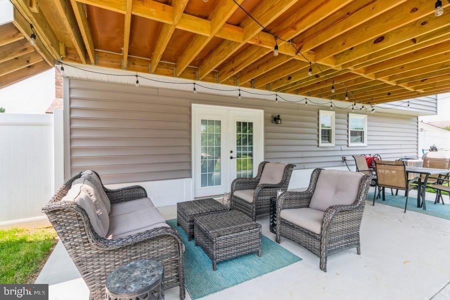 1008 London Circle Williamstown, NJ 08094 - Photo 21 of 25 a outdoor living space with furniture and a couch