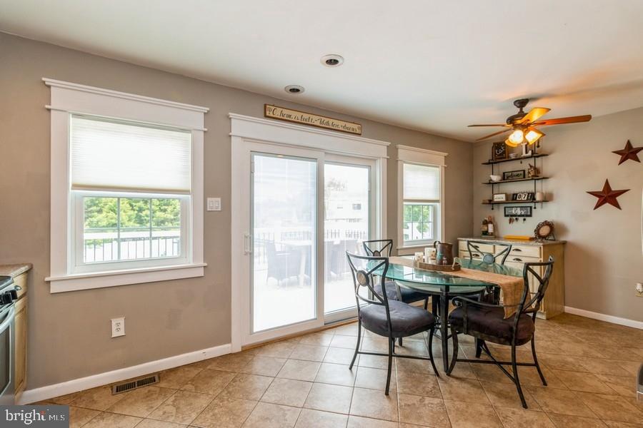 1008 London Circle Williamstown, NJ 08094 - Photo 6 of 25 a view of a dining room with furniture and chandelier
