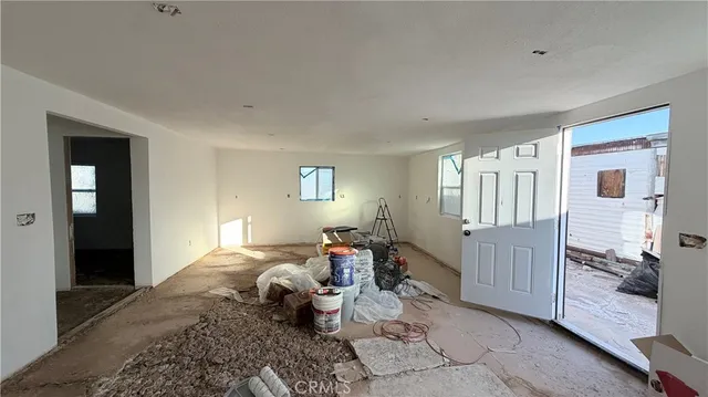 a view of a room that has a window in it