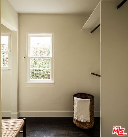 a bathroom with a shower and a sink