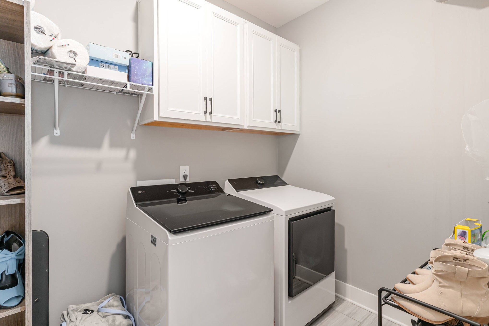 203 Caroline Way Mount Juliet, TN 37122 - Photo 15 of 37 a utility room with cabinets