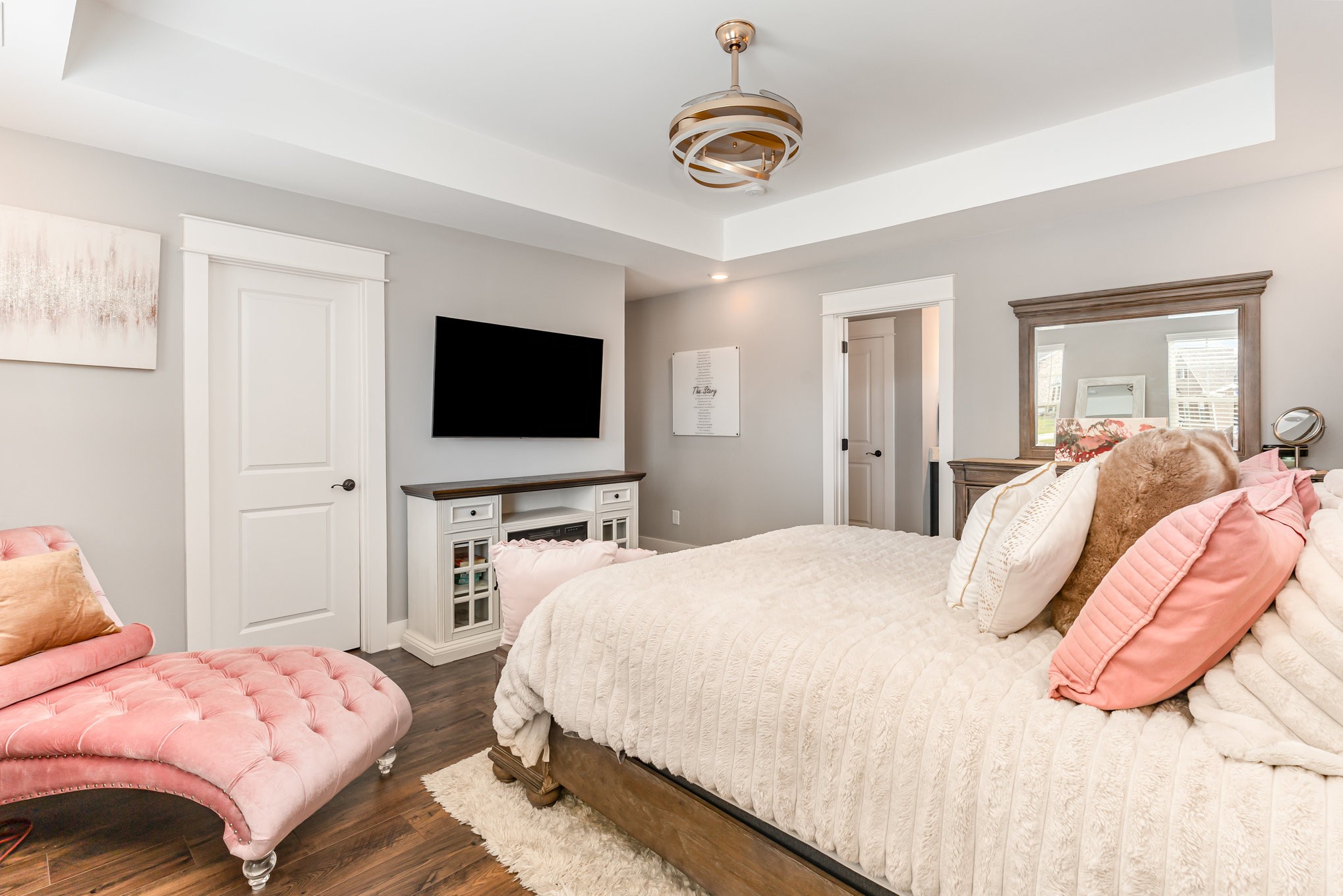 203 Caroline Way Mount Juliet, TN 37122 - Photo 19 of 37 a bedroom with a bed and a flat screen tv