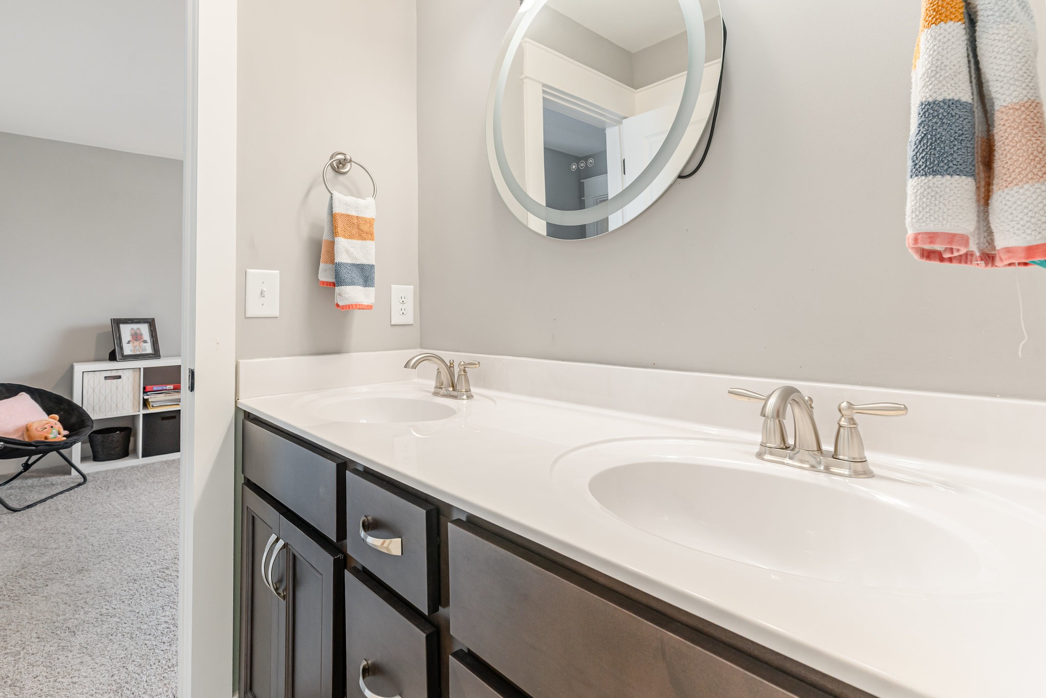 203 Caroline Way Mount Juliet, TN 37122 - Photo 24 of 37 a bathroom with a sink and a mirror