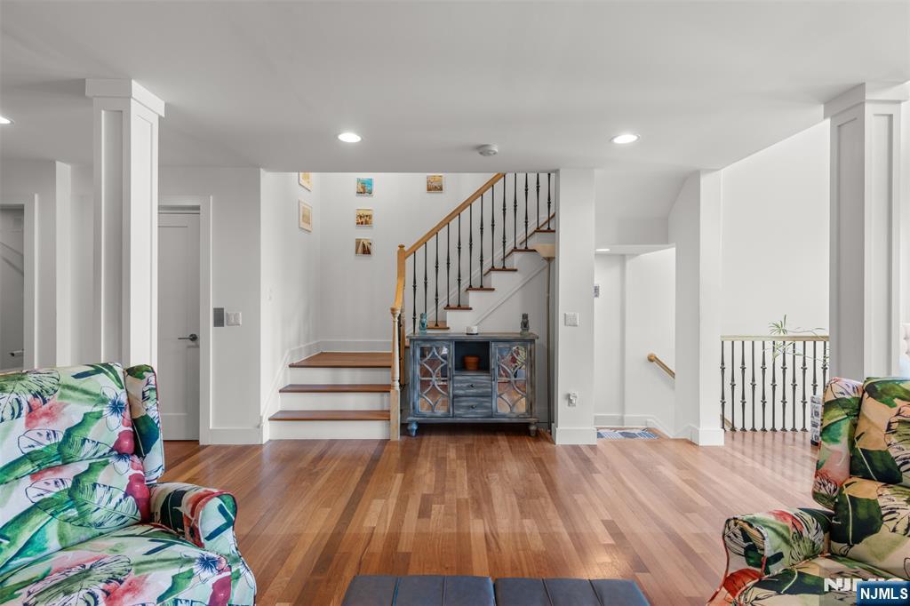 7 Oakdene Terrace, Unit 7 Edgewater, NJ 07020 - Photo 9 of 30 a view of entryway with stairs and wooden floor