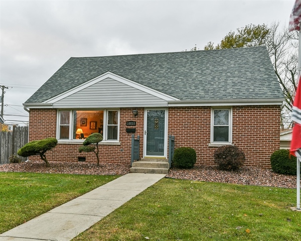 10818 Austin Avenue Chicago Ridge, IL 60415 - Photo 1 of 16 a front view of a house with garden