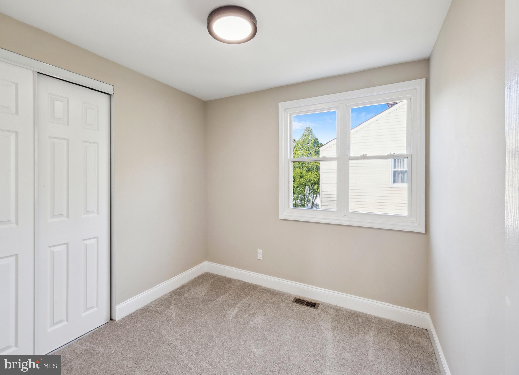 44 Pershing Lane Sicklerville, NJ 08081 - Photo 15 of 24 an empty room with a window