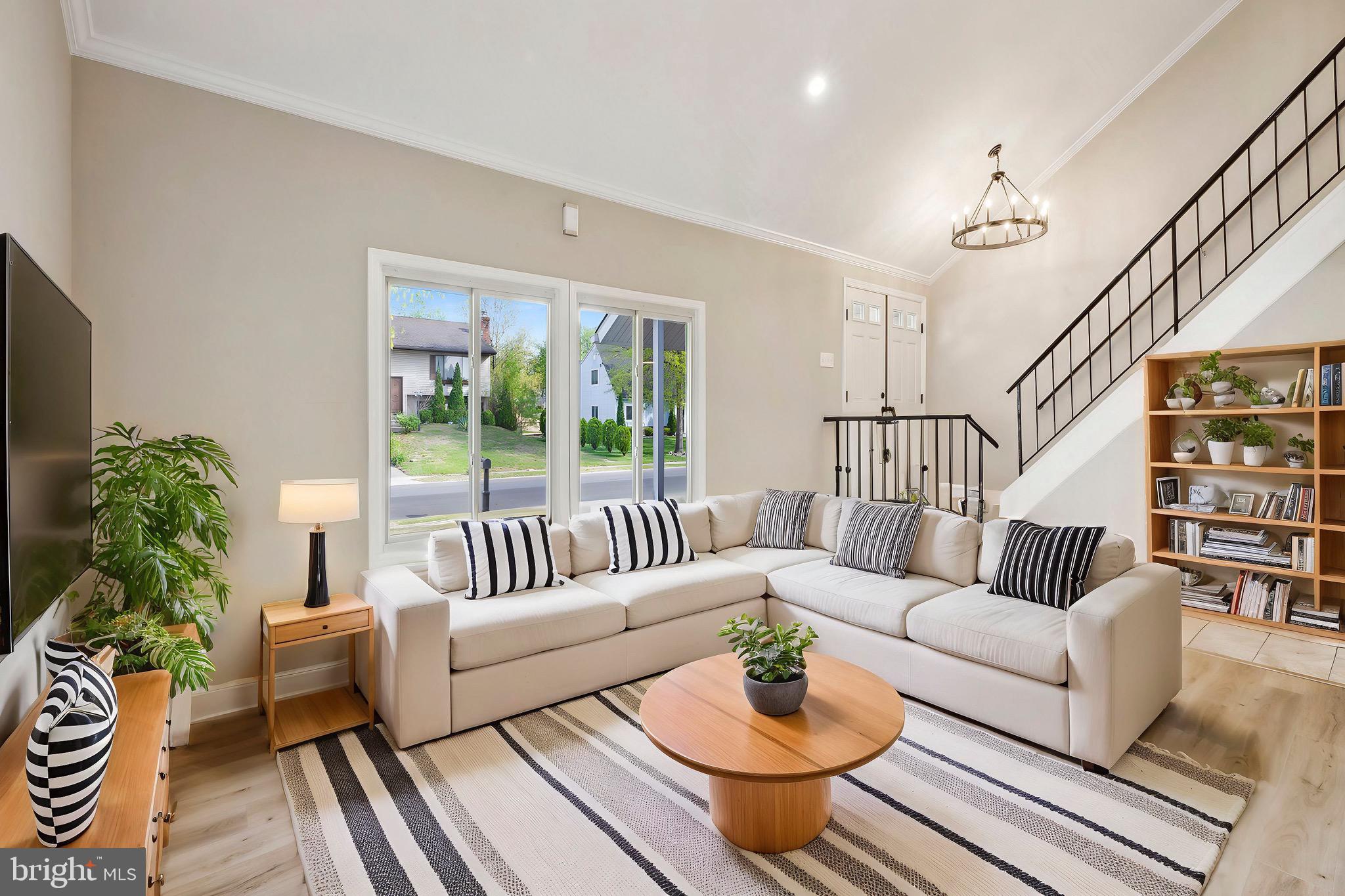 44 Pershing Lane Sicklerville, NJ 08081 - Photo 18 of 24 a living room with furniture and a large window