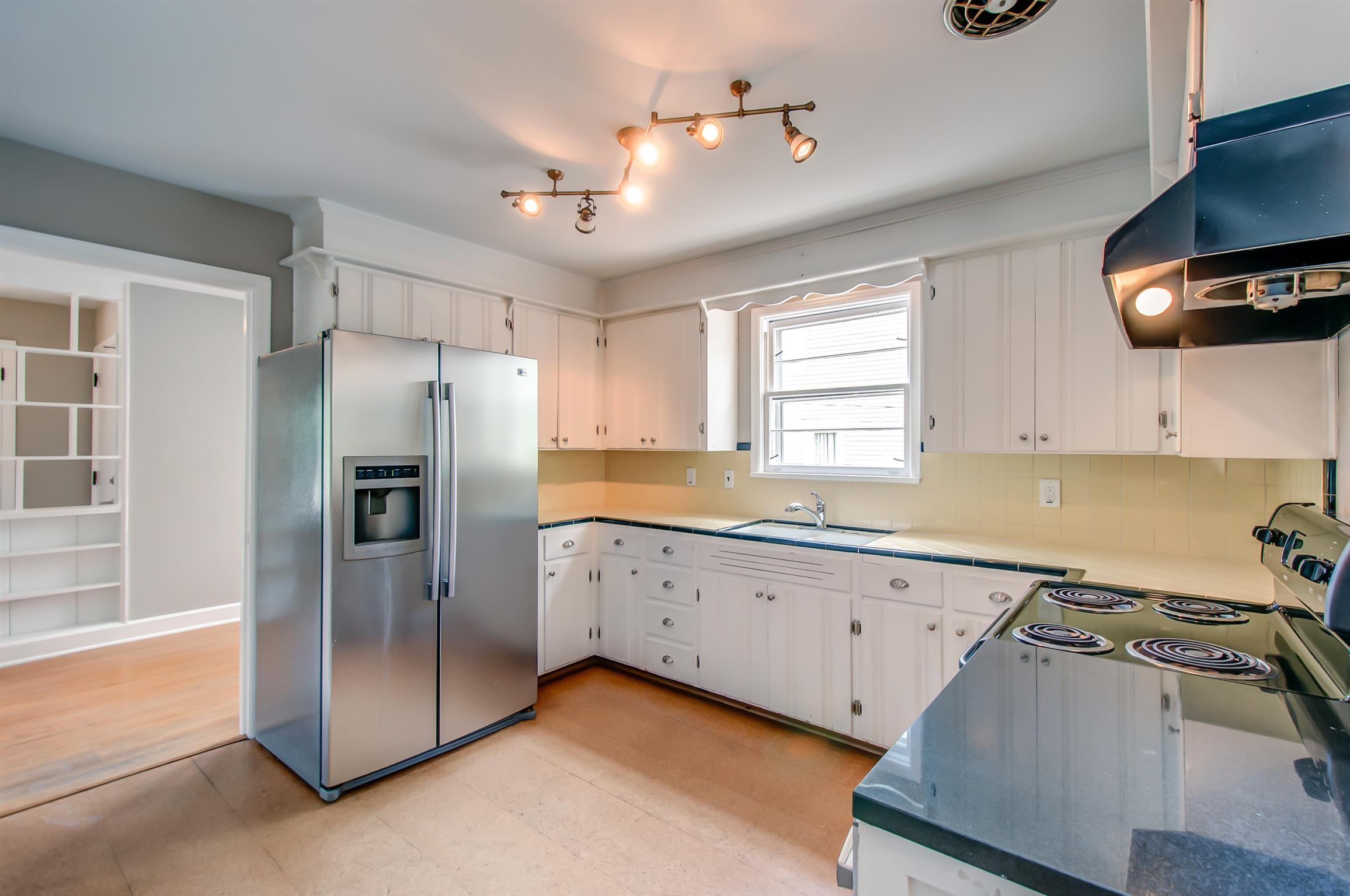4007 Murphy Road Nashville, TN 37209 - Photo 10 of 27 Updated kitchen with stainless steel appilances.