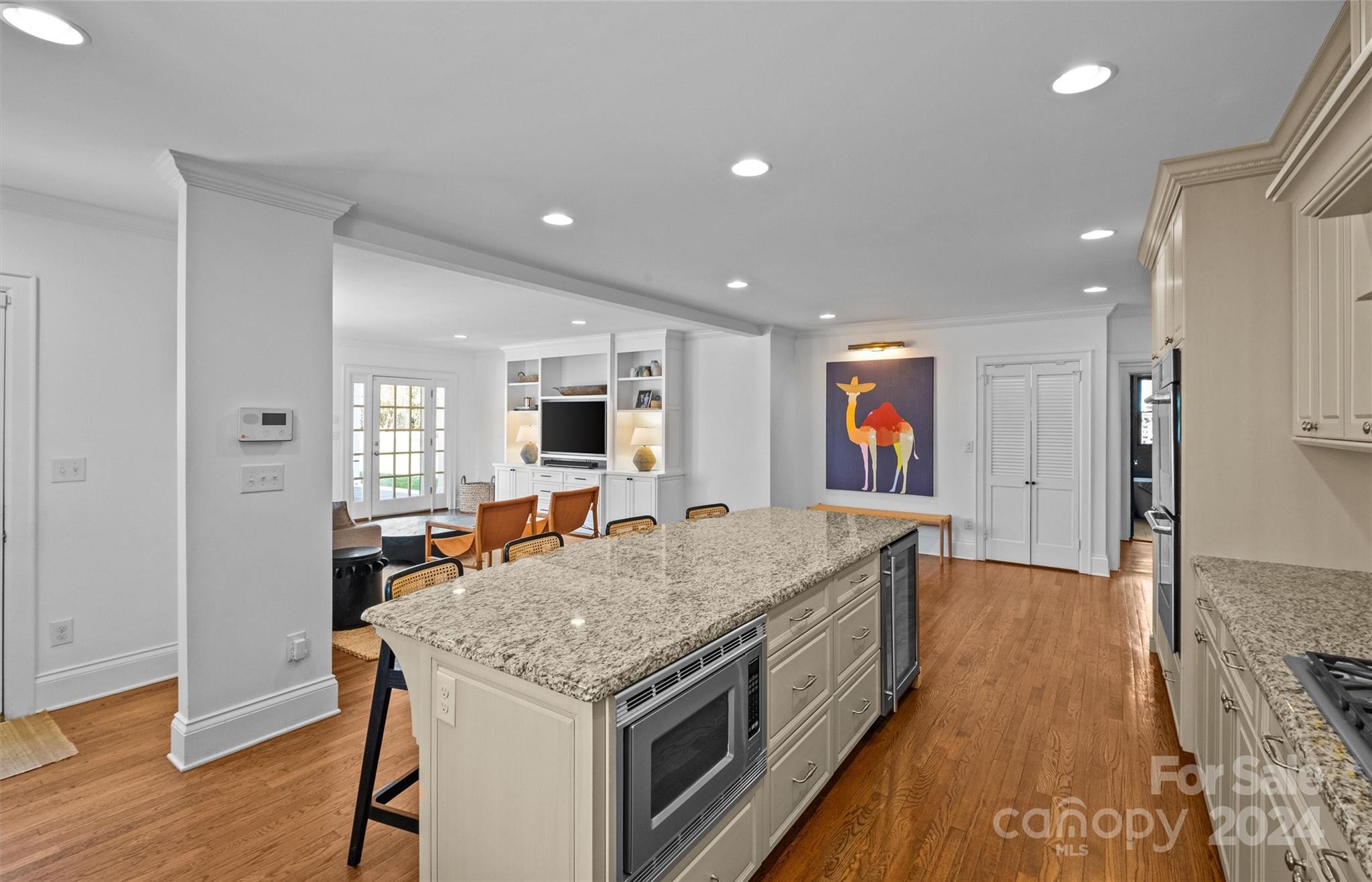 2326 Croydon Road Charlotte, NC 28207 - Photo 13 of 44 a kitchen with a stove and a view of living room