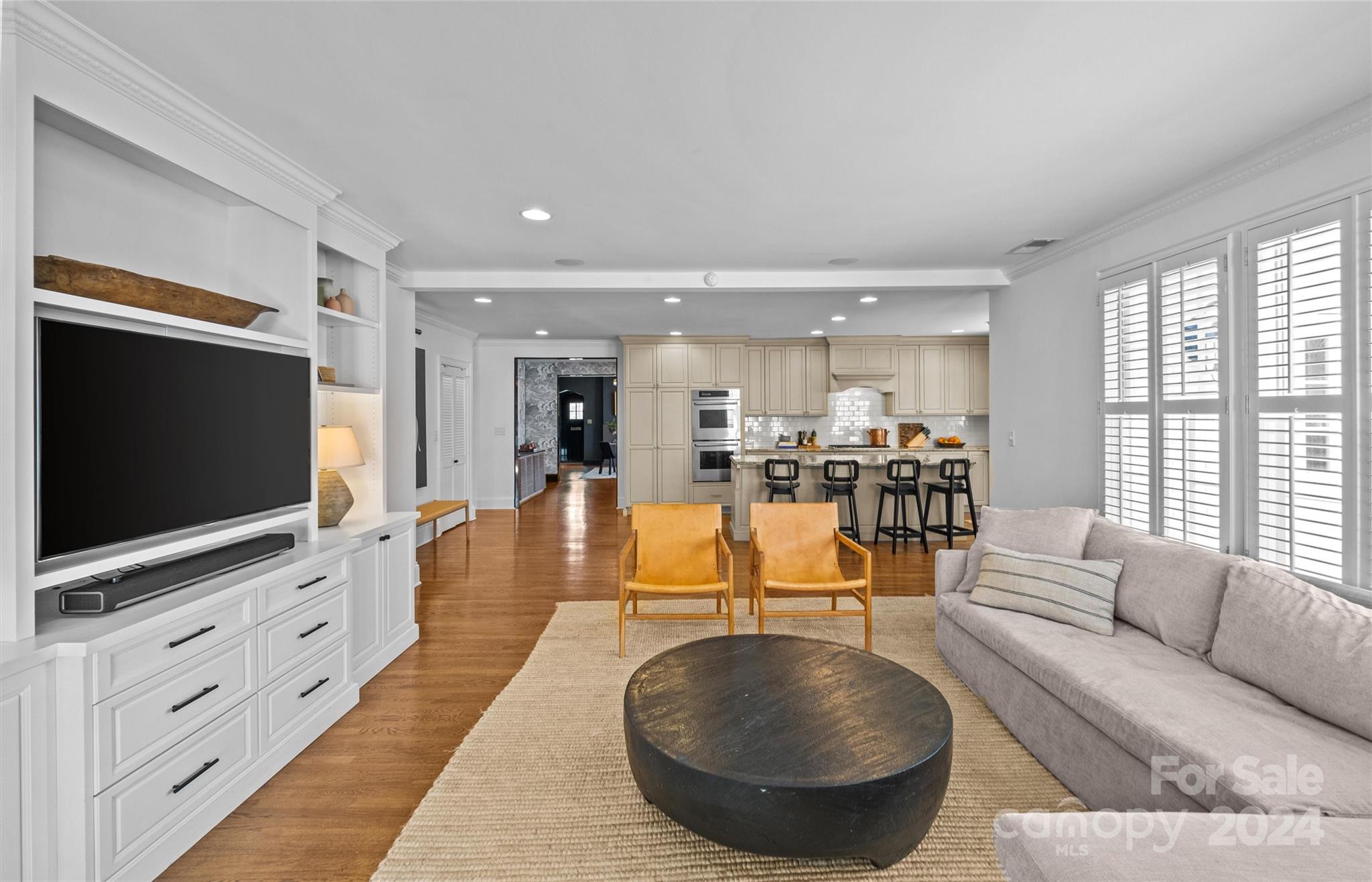 2326 Croydon Road Charlotte, NC 28207 - Photo 15 of 44 a living room with furniture and a flat screen tv