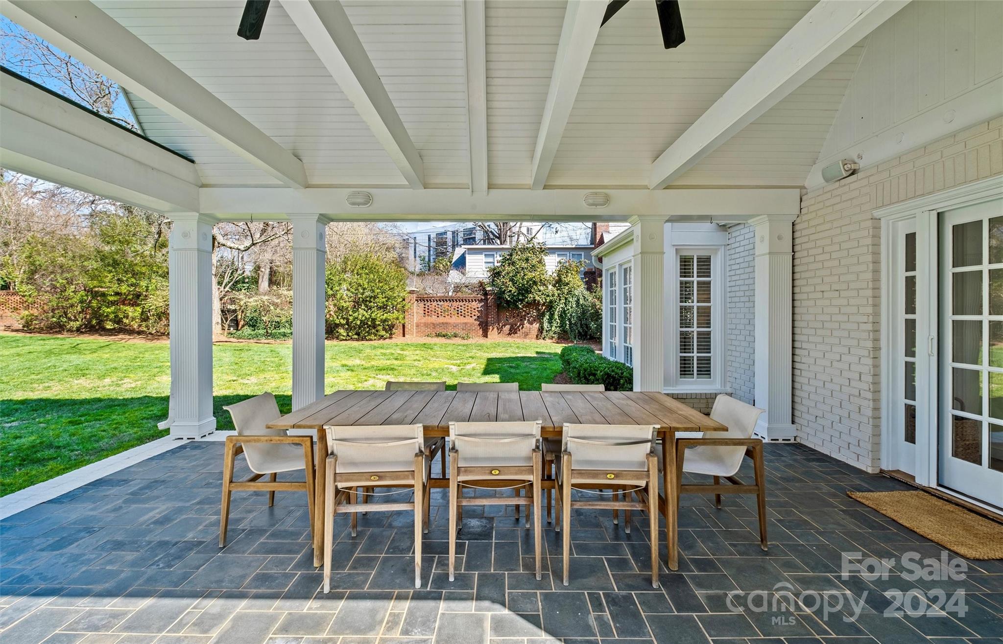 2326 Croydon Road Charlotte, NC 28207 - Photo 17 of 44 a view of a dining room with furniture window and wooden floor