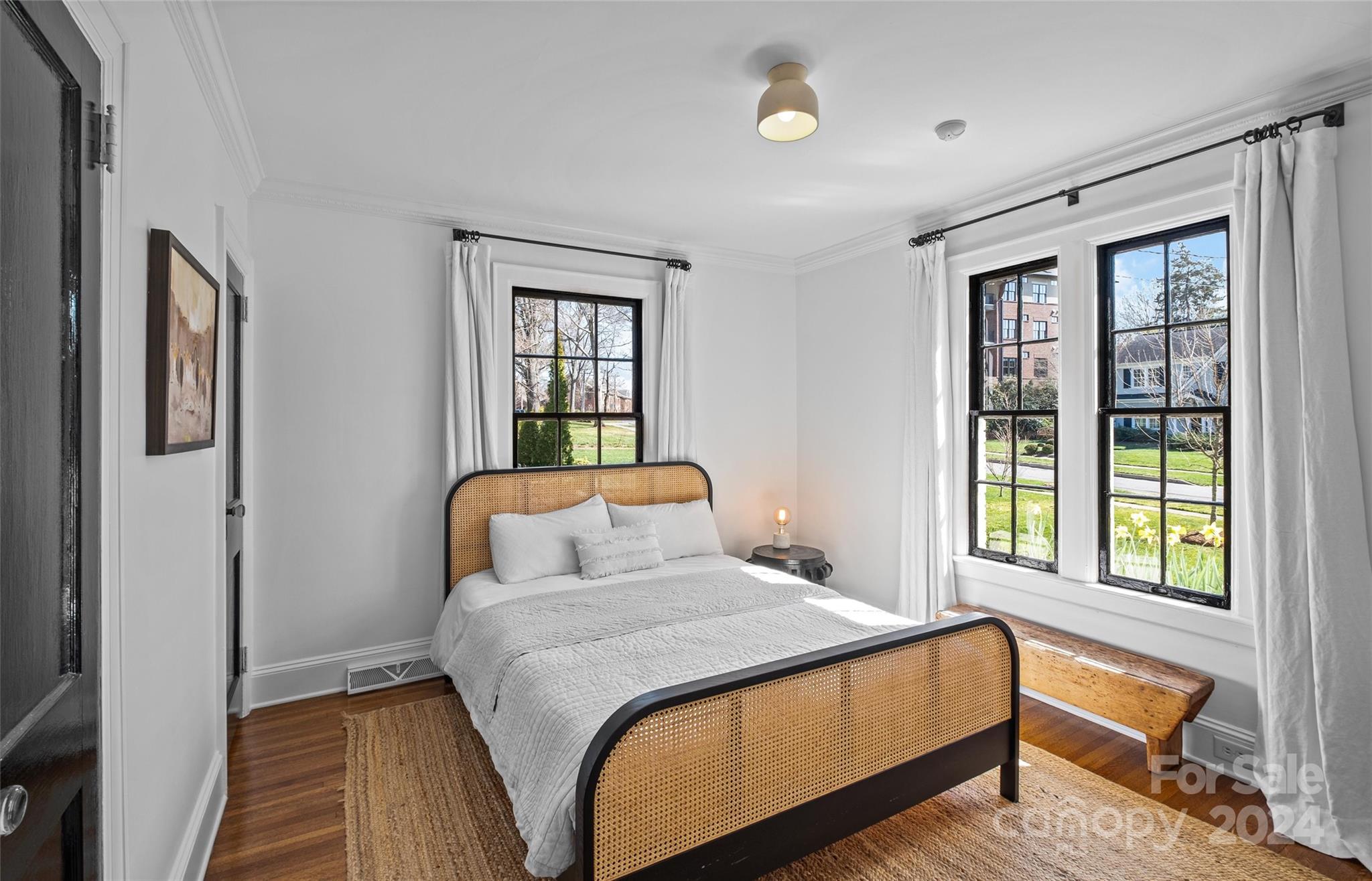 2326 Croydon Road Charlotte, NC 28207 - Photo 19 of 44 a bedroom with a bed and a window