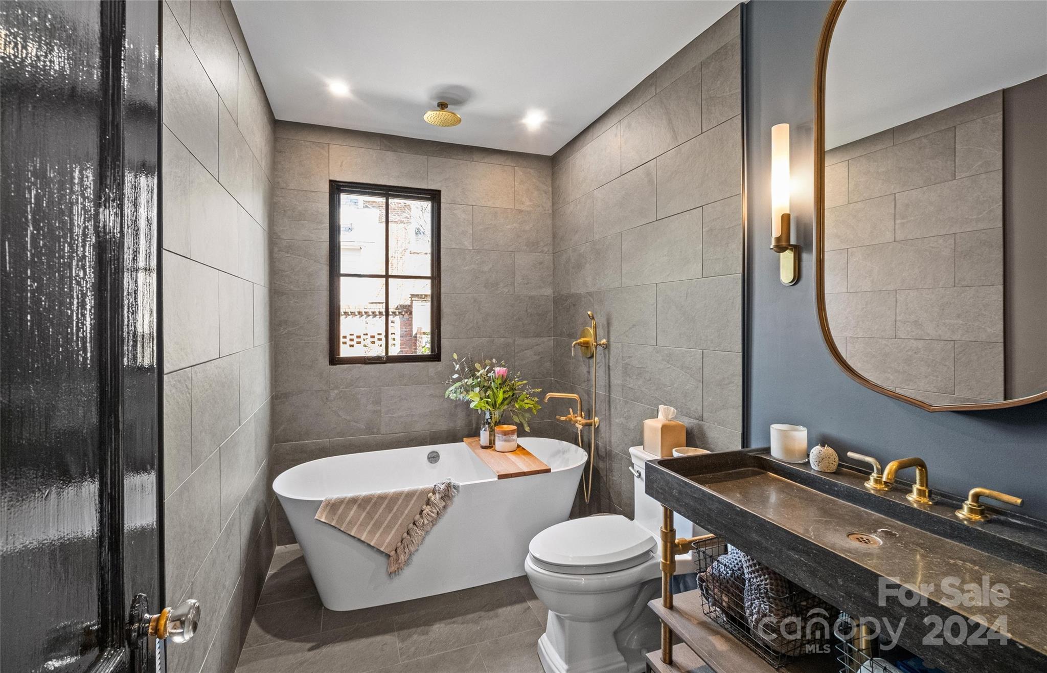 2326 Croydon Road Charlotte, NC 28207 - Photo 20 of 44 a bathroom with a granite countertop sink mirror vanity and toilet