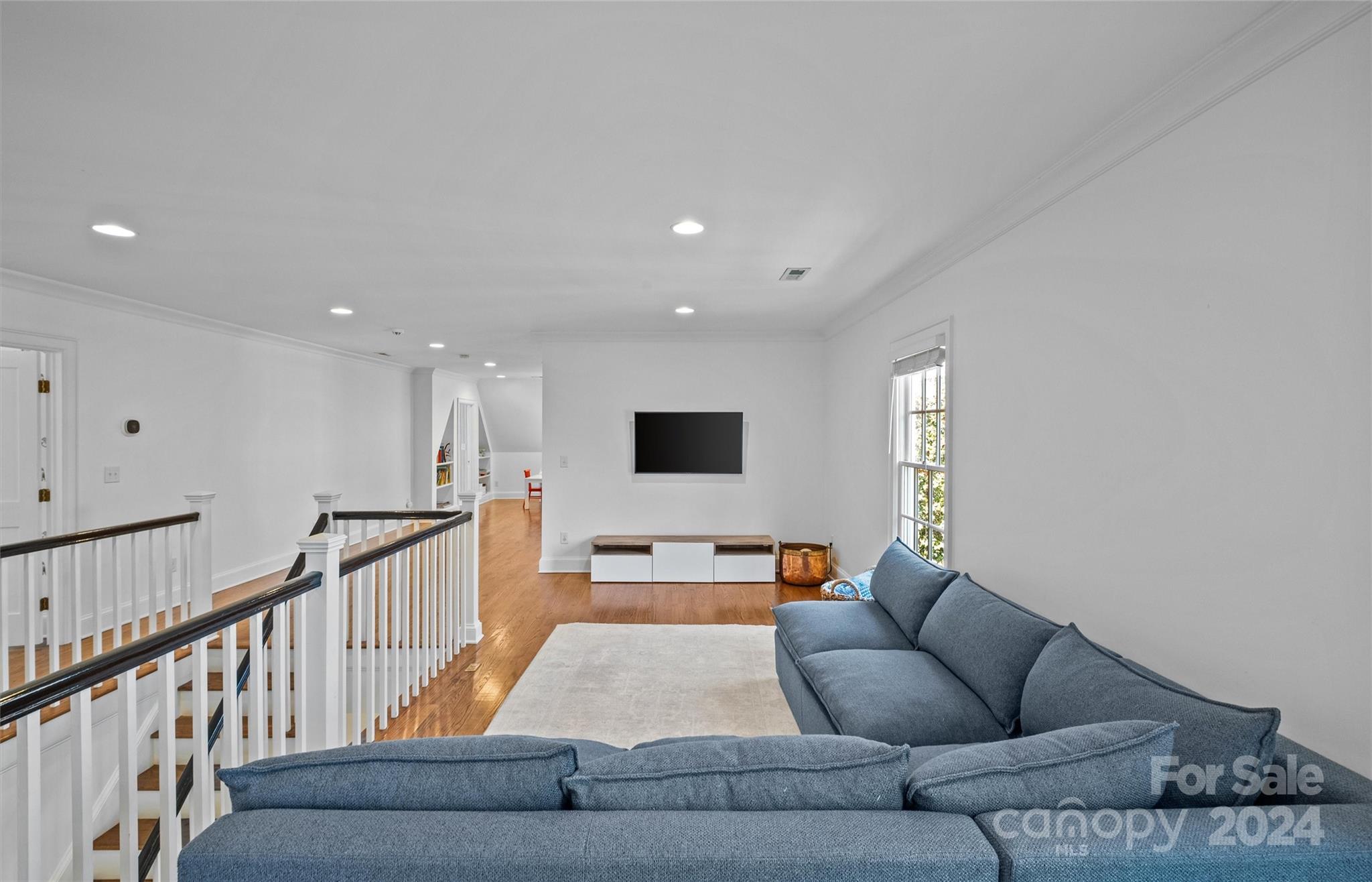 2326 Croydon Road Charlotte, NC 28207 - Photo 26 of 44 a living room with furniture and a couch