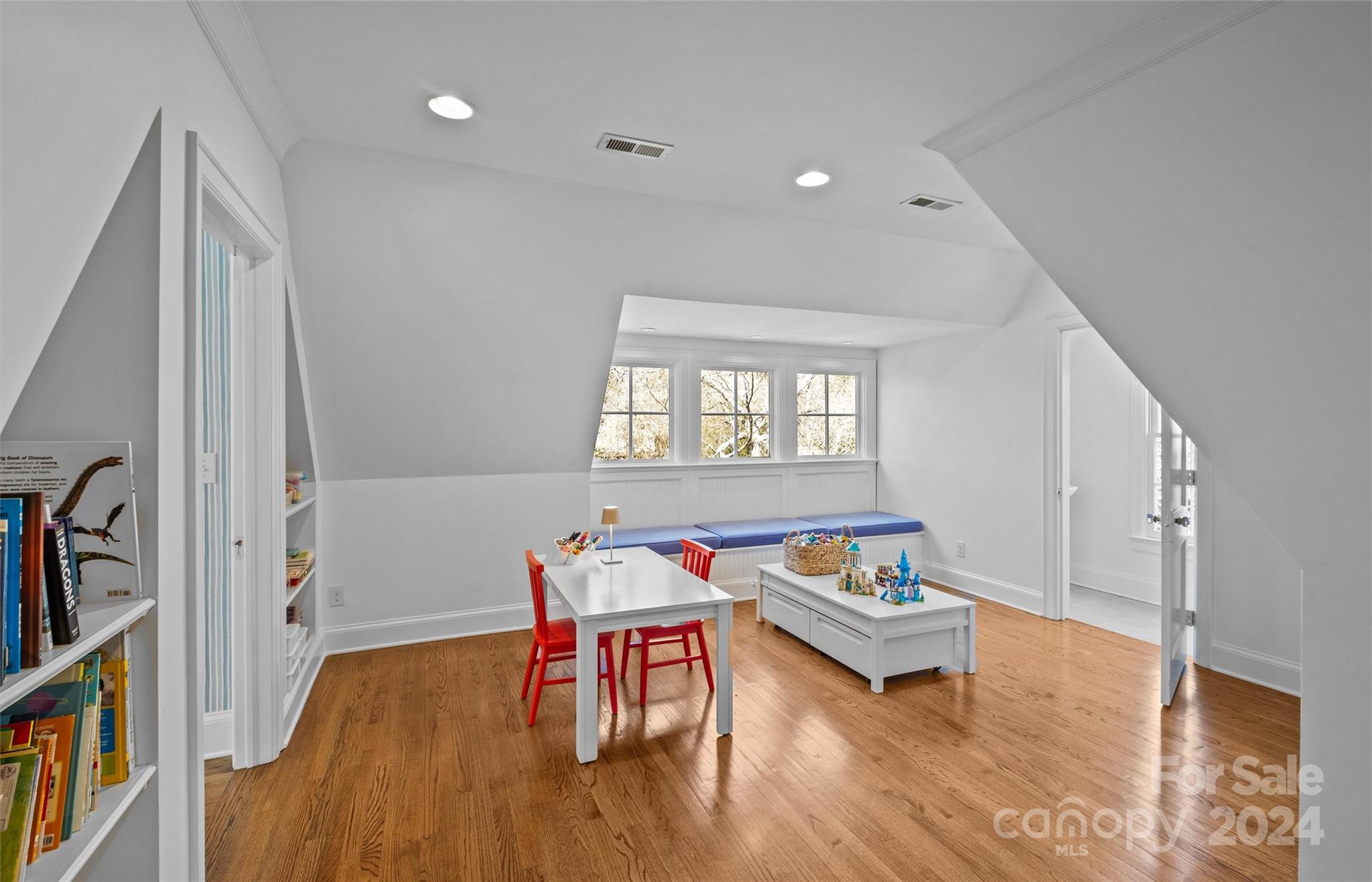 2326 Croydon Road Charlotte, NC 28207 - Photo 27 of 44 a living room with furniture and a wooden floor