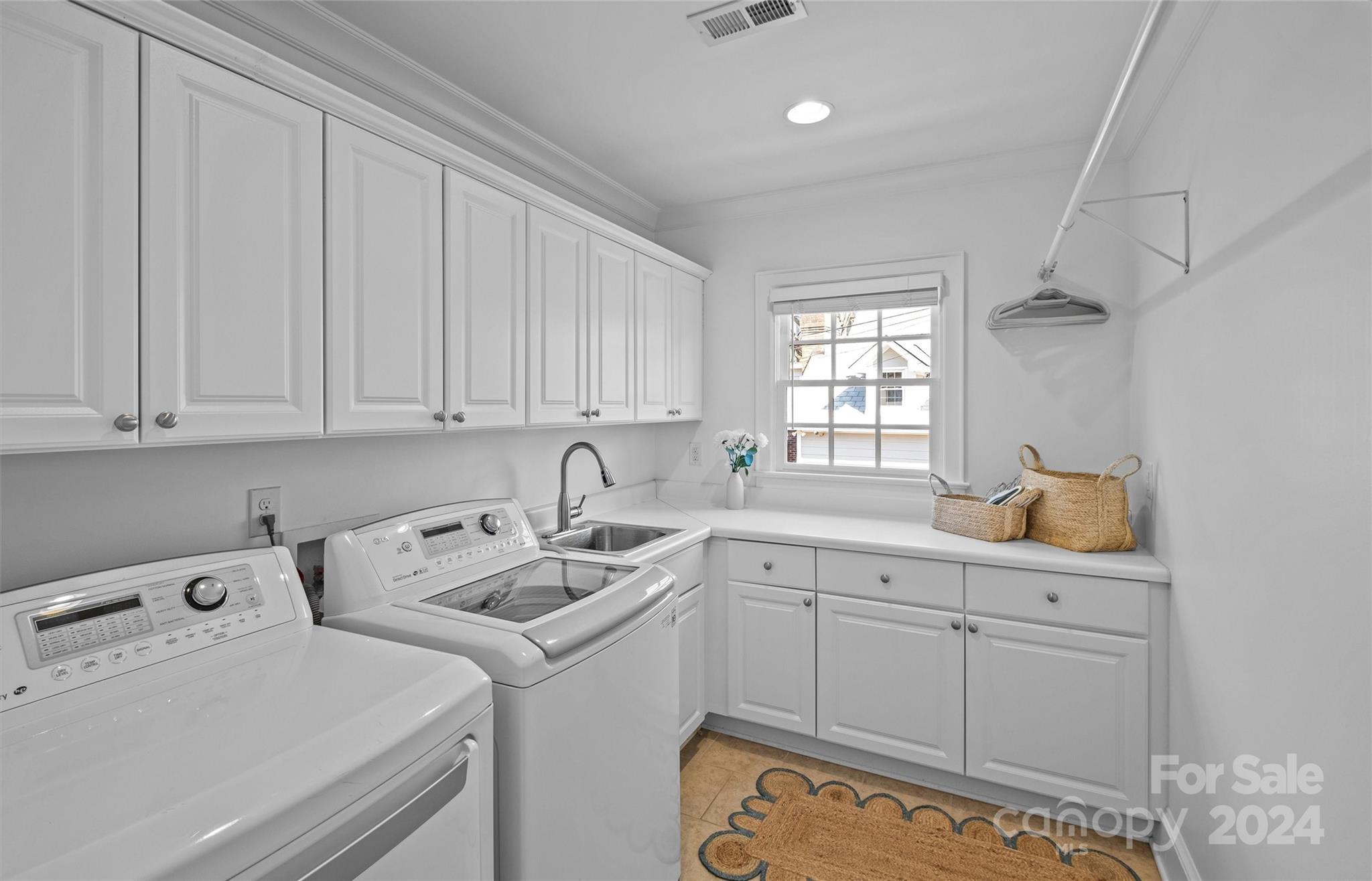 2326 Croydon Road Charlotte, NC 28207 - Photo 33 of 44 a room with storage and utility