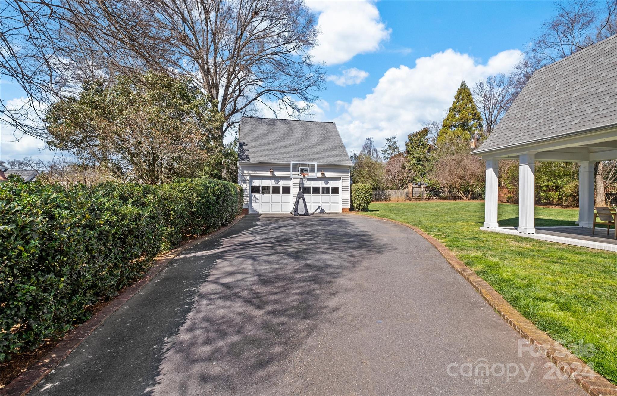 2326 Croydon Road Charlotte, NC 28207 - Photo 35 of 44 a view of a backyard with a garden and plants