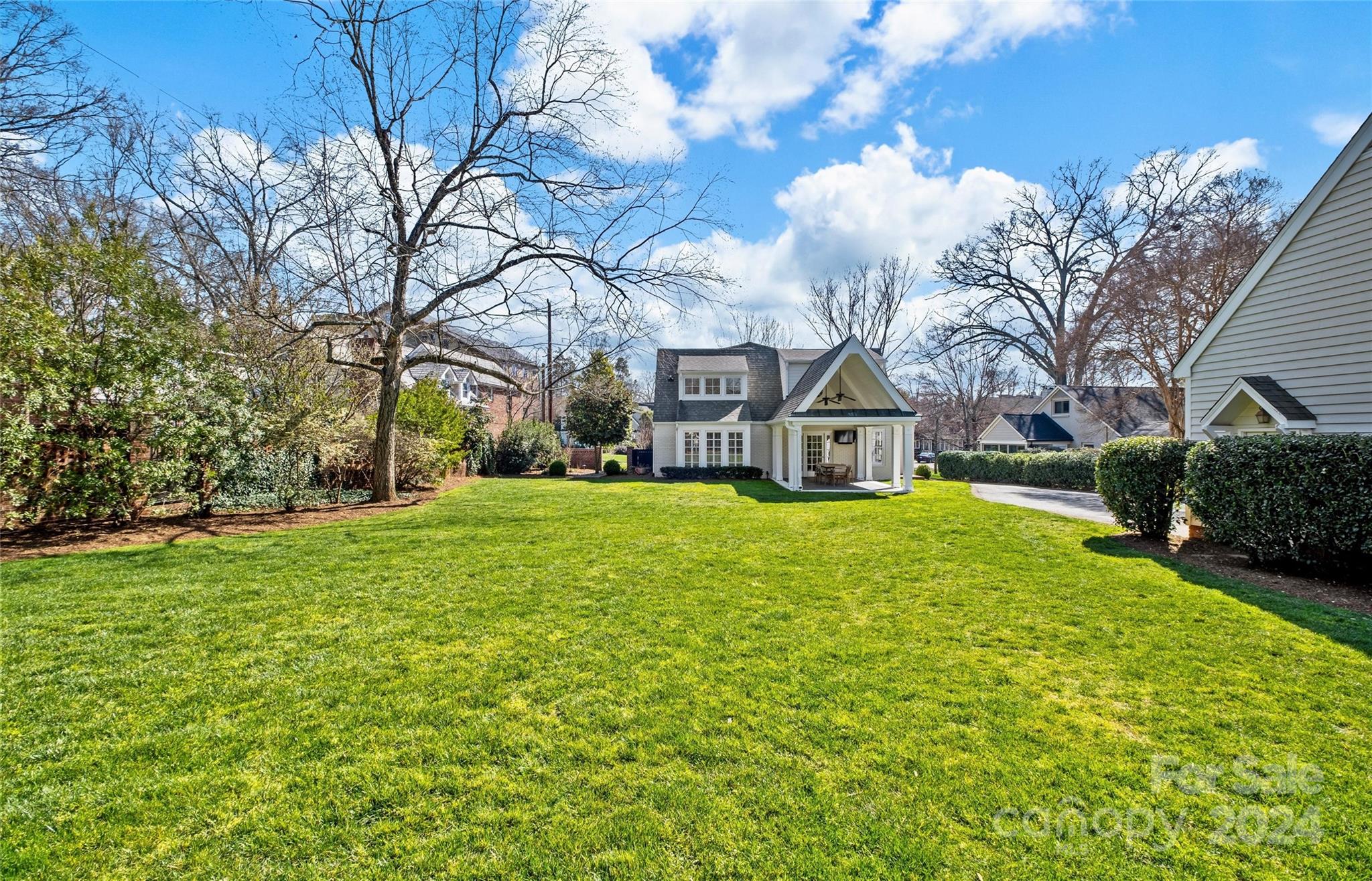 2326 Croydon Road Charlotte, NC 28207 - Photo 38 of 44 a front view of house with yard and green space