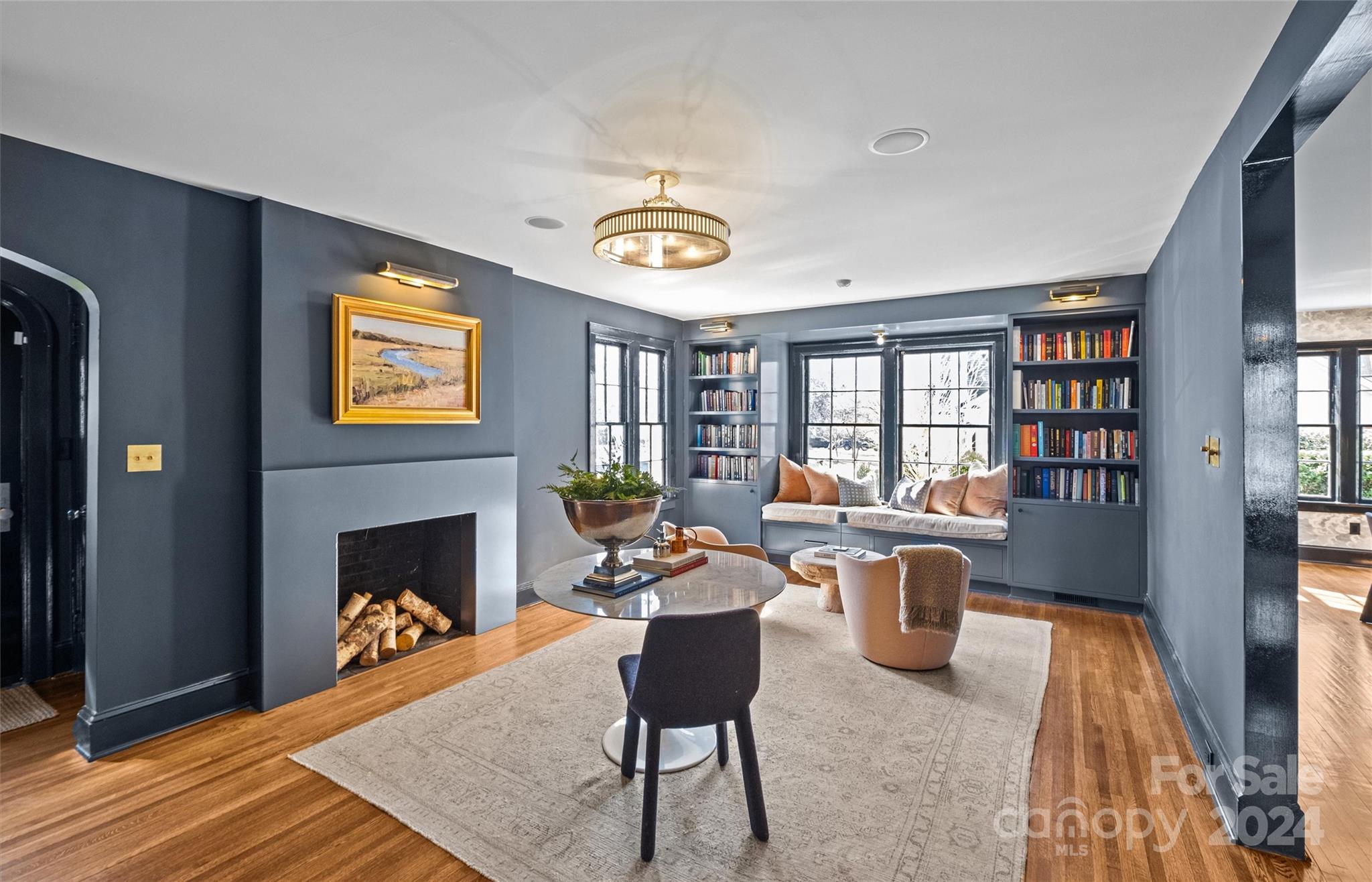 2326 Croydon Road Charlotte, NC 28207 - Photo 6 of 44 a living room with furniture and a fireplace