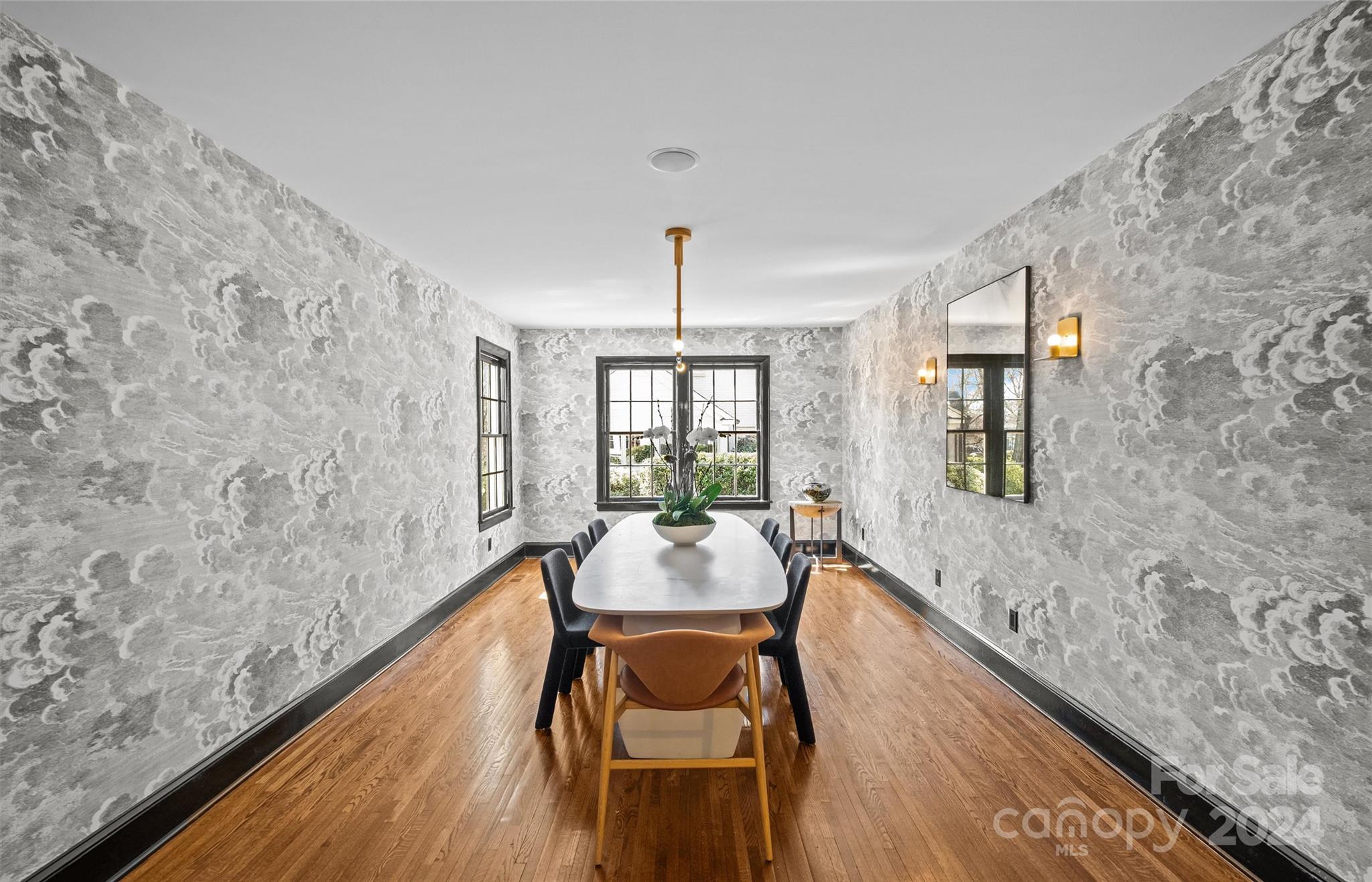 2326 Croydon Road Charlotte, NC 28207 - Photo 8 of 44 a dining room with table and wooden floor