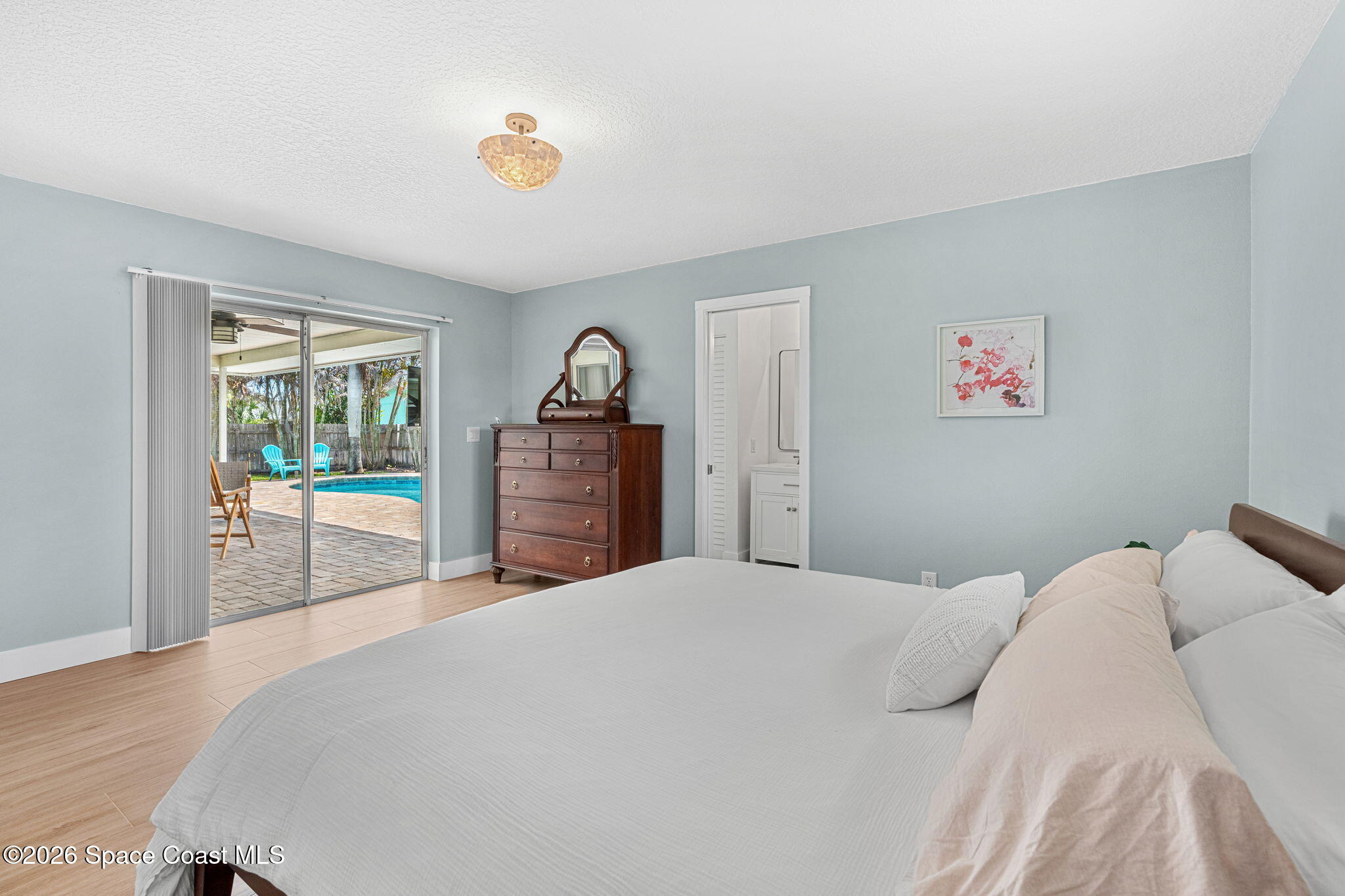 429 Rio Lane Indialantic, FL 32903 - Photo 21 of 50 a bedroom with a large bed and a window