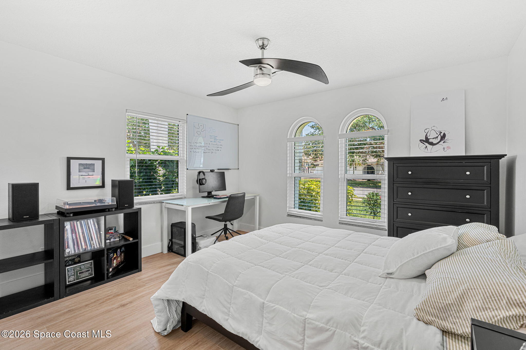429 Rio Lane Indialantic, FL 32903 - Photo 27 of 50 a bedroom with a bed and a flat screen tv