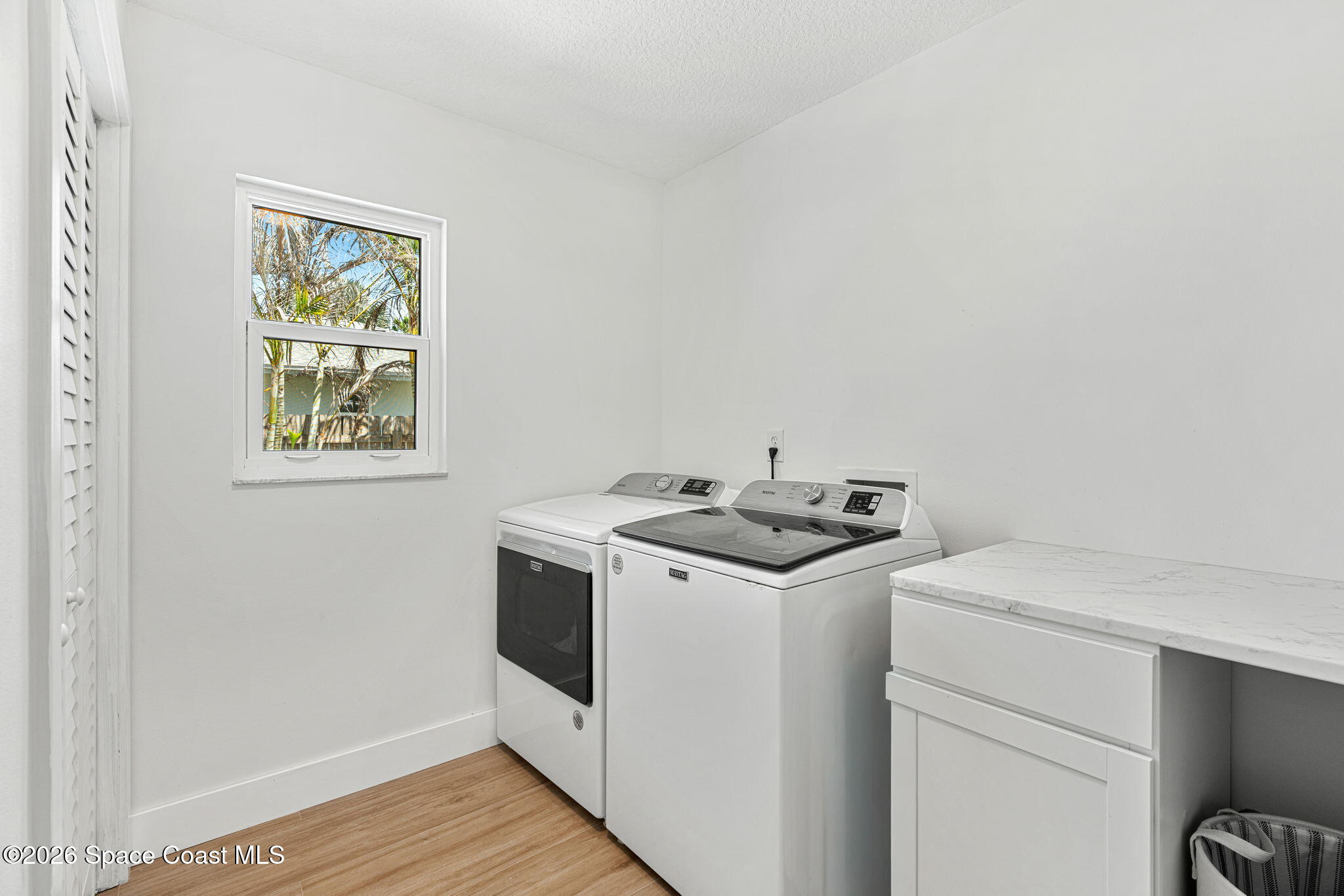 429 Rio Lane Indialantic, FL 32903 - Photo 32 of 50 a utility room with dryer and washer